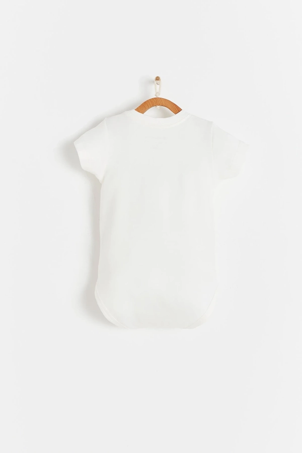 Short Sleeve Bodysuit with round necklace and boat printed at the front. Button snaps on the shoulder for easy fit. Back view