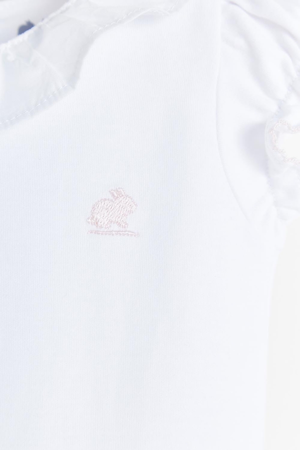 Essentials Ruffles Short Sleeve Bodysuit. Embroidery detail view