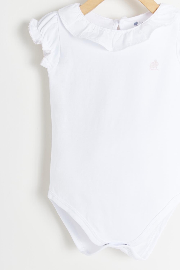 Essentials Ruffles Short Sleeve Bodysuit. Detail view