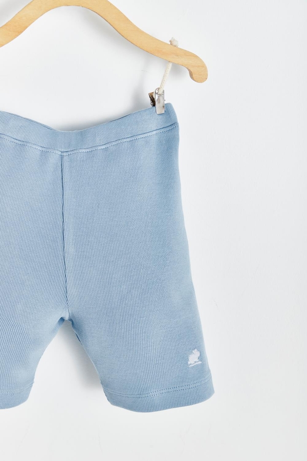 Ribbed Cotton Bike Shorts. Plain light blue with logo embreoidered at the front. Detail view.