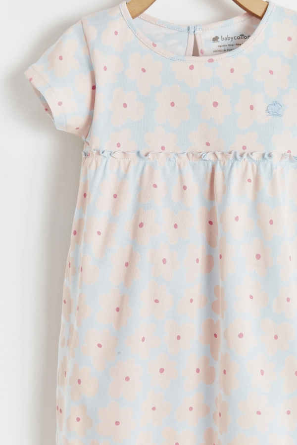 Flower Cotton Dress. Short sleeve and round necklace. Detail view.