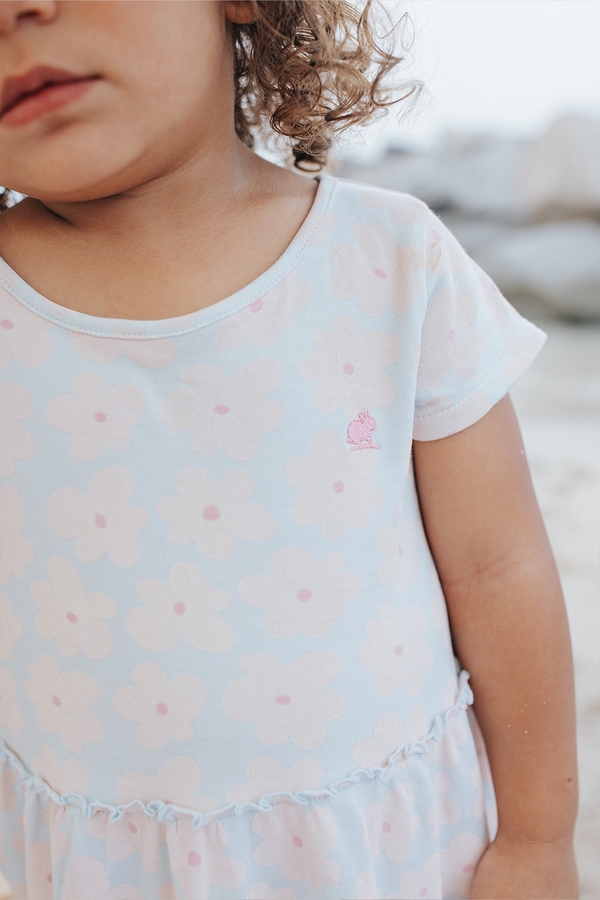 Flower Cotton Dress. Short sleeve and round necklace. Kid model view.