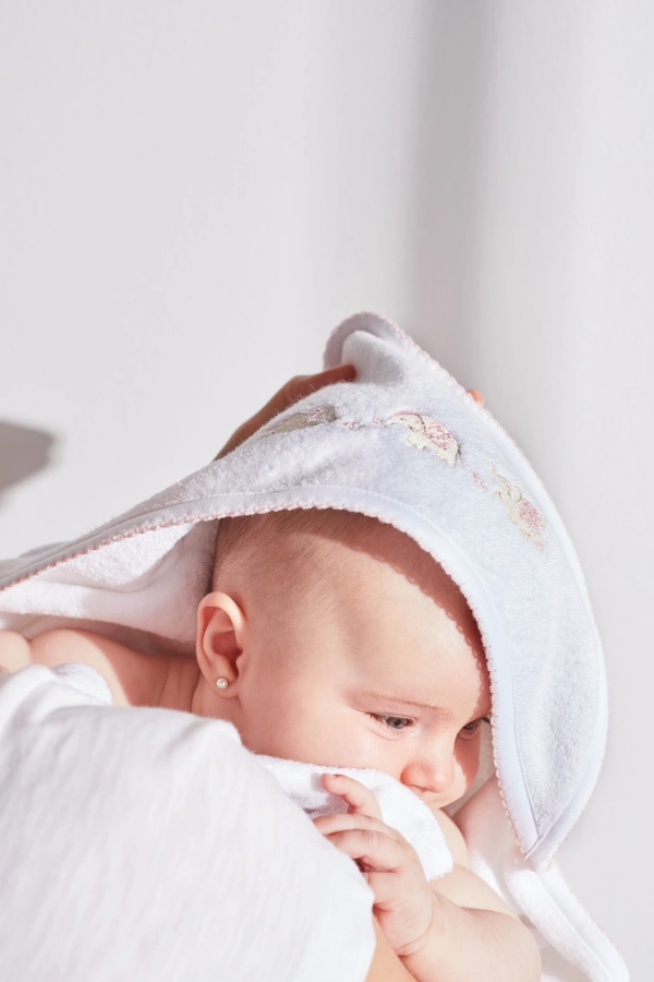 Premium Cotton Tika Small Hooded Towel for Infant. Baby model view